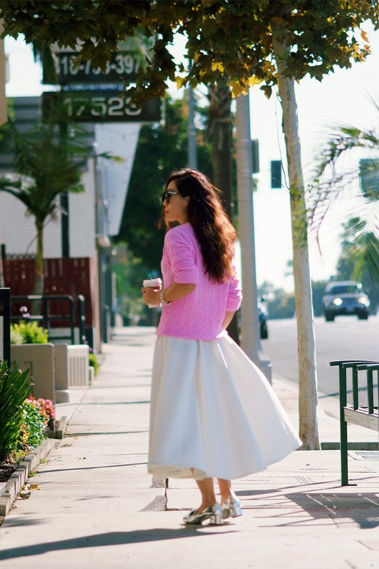 HallieSwanson J.Crew Pink Sweater, Full White Skirt, Miu Miu Bow Metallic Loafers_0