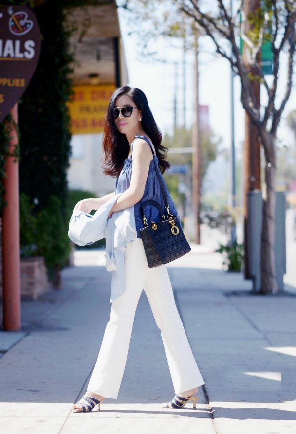 Pristine White Bags Are The Polished Arm Candy Of The Moment | Vogue