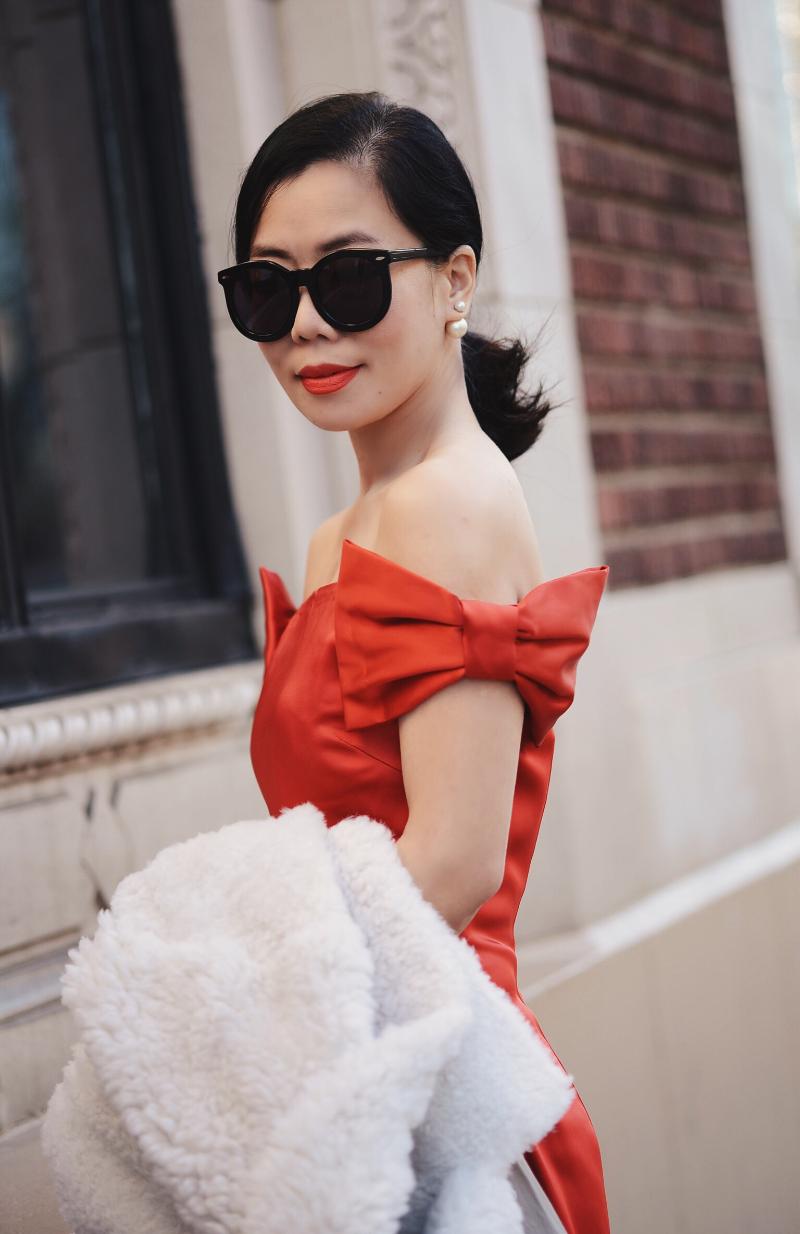 Holiday Dressing in Red Dress with Bow , Shearling Coat, via: HallieDaily