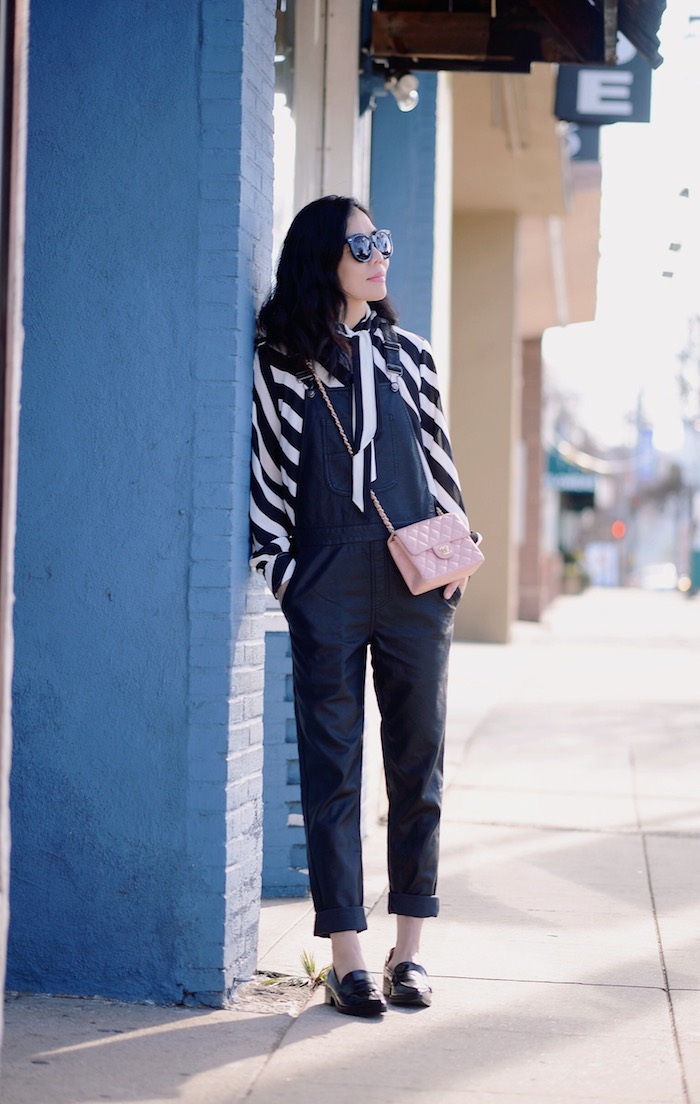 Tie Bow Shirt, Leather Look Overalls, Loafers, Mini Pink Chanel, Via: HallieDaily