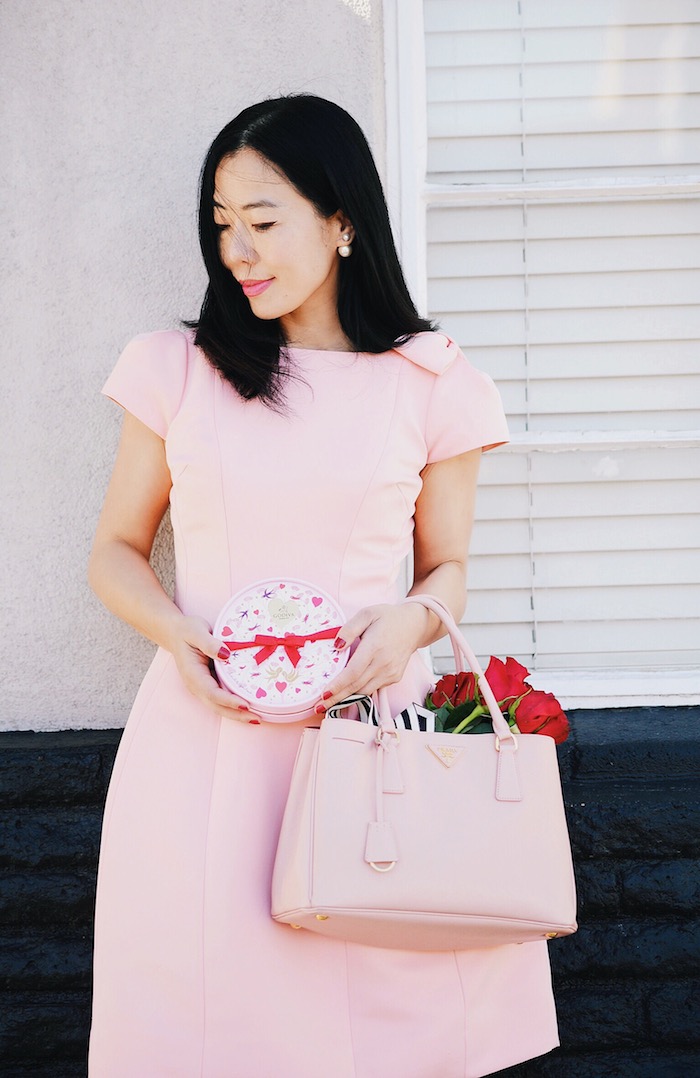 Pink & Red For Valentine's Day, Flowers, GODIVA Chocolate, Teri Jon by Rickie Freeman Pink Dress with Bow, Miu Miu Bow Pumps, Prada Bag, via: HallieDaily