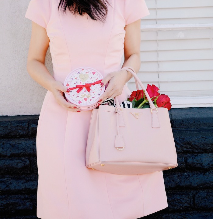 Pink & Red For Valentine's Day, Flowers, GODIVA Chocolate, Teri Jon by Rickie Freeman Pink Dress with Bow, Miu Miu Bow Pumps, Prada Bag, via: HallieDaily