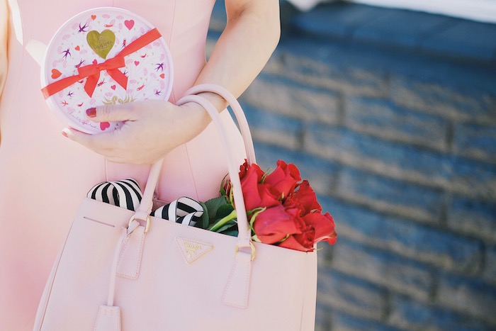 Pink & Red For Valentine's Day, Flowers, GODIVA Chocolate, Teri Jon by Rickie Freeman Pink Dress with Bow, Miu Miu Bow Pumps, Prada Bag, via: HallieDaily