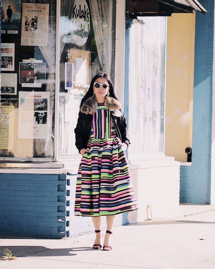 House of Holland Rainbow Dress, Andrew Mark Leather Jacket with Fur Collar, Dior Sunglasses, Zara Flower Earrings, via: HallieDaily