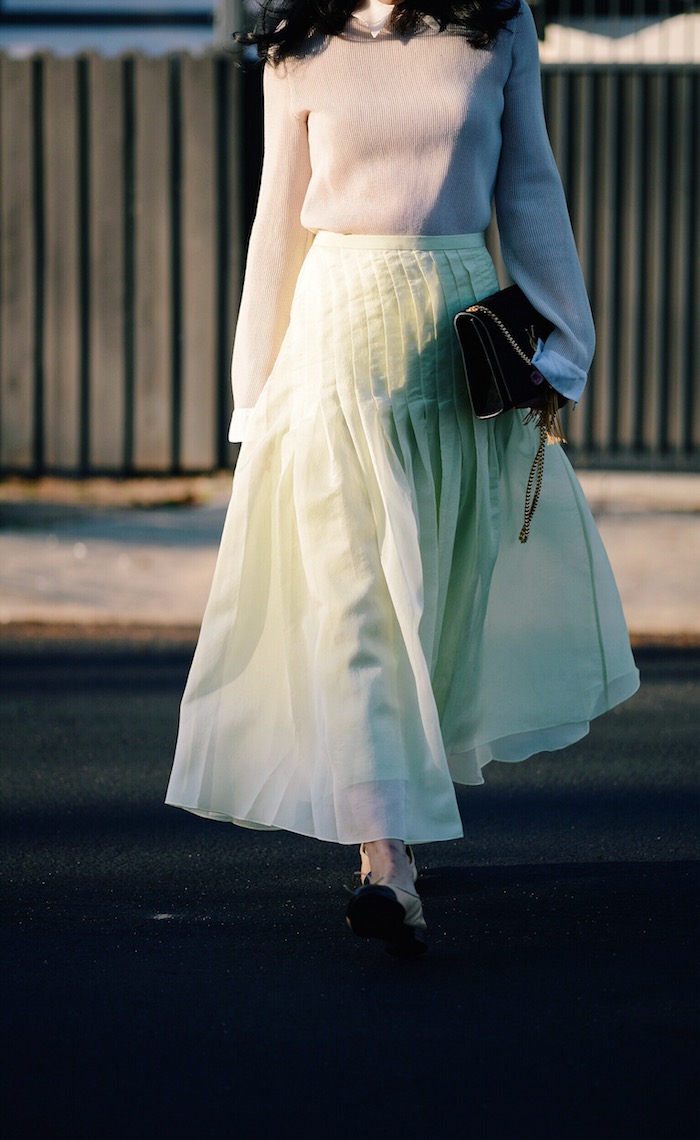 Sunset: Tibi Pleated Skirt, Chanel Two-tone Flats, YSL Bag, via: HallieDaily