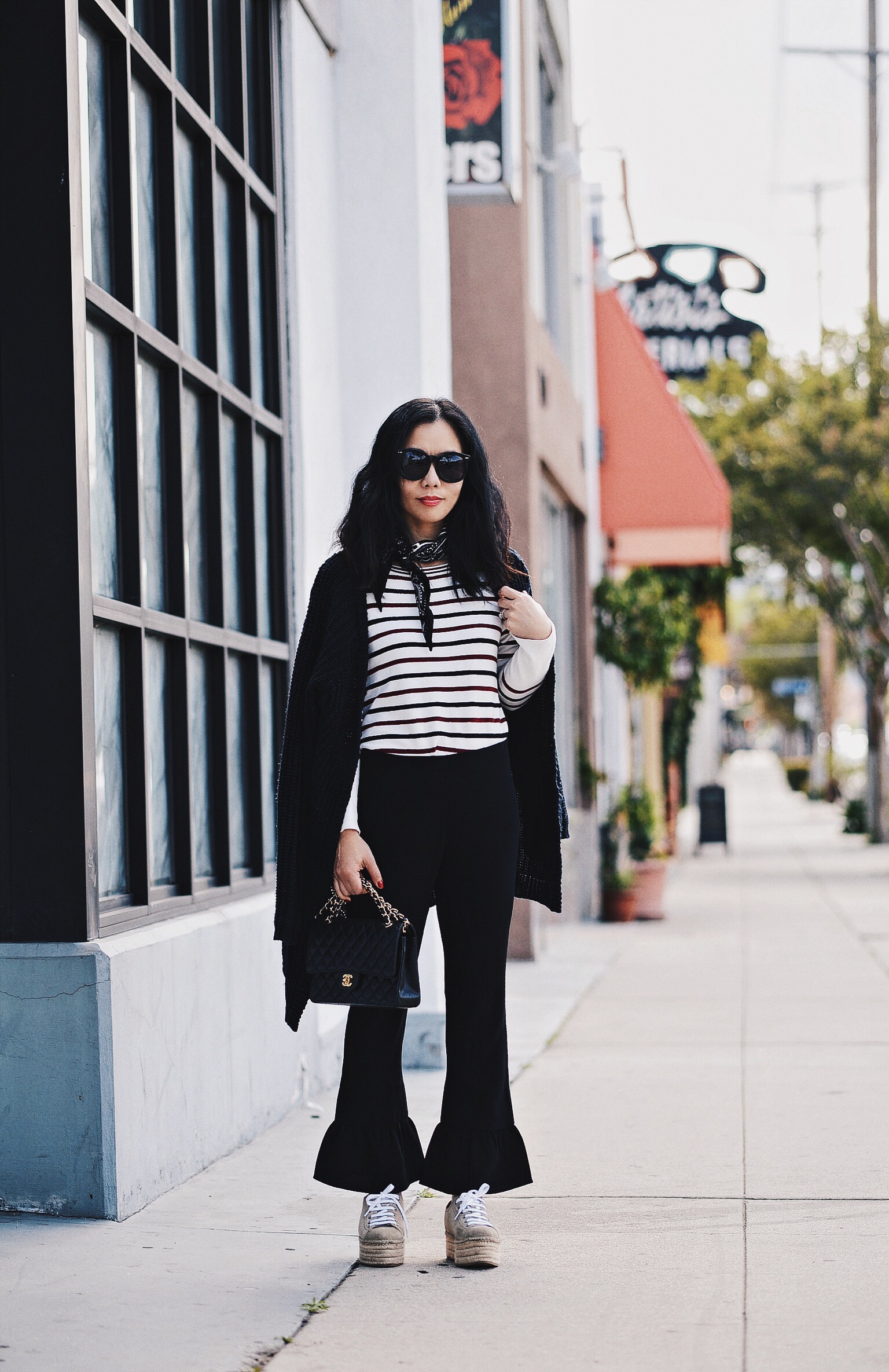 Funday Friday, Elizabeth and James Ruffled Flared Pants, Stripes Top, Miu Miu Platform Sneakers, Chanel Bag, via: HallieDaily