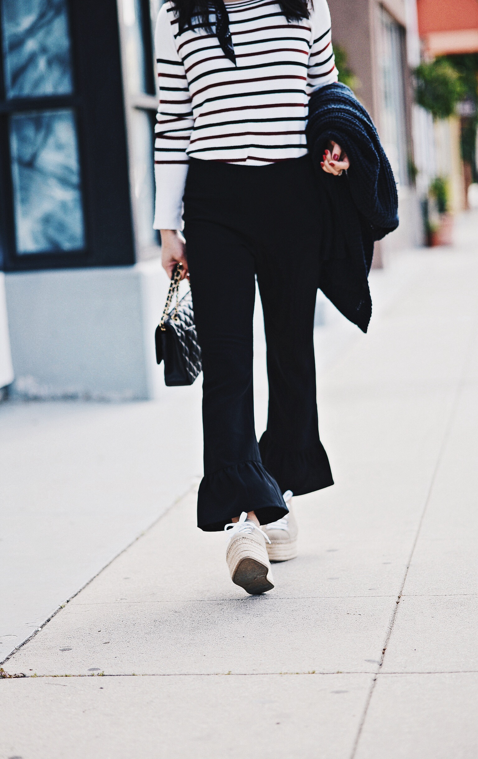 Funday Friday, Elizabeth and James Ruffled Flared Pants, Stripes Top, Miu Miu Platform Sneakers, Chanel Bag, via: HallieDaily