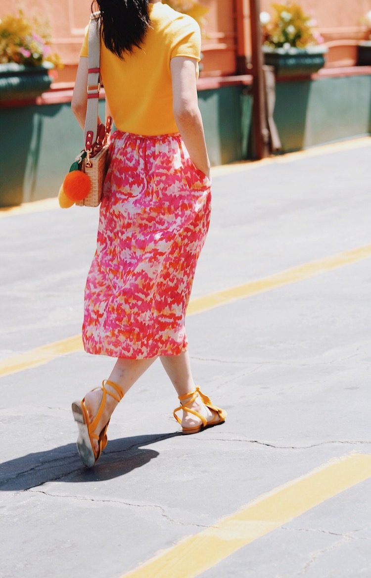 Mellow Yellow: Summer Weight Knit, Floral Skirt, Floral Sandals, Straw Bag, via: HallieDaily