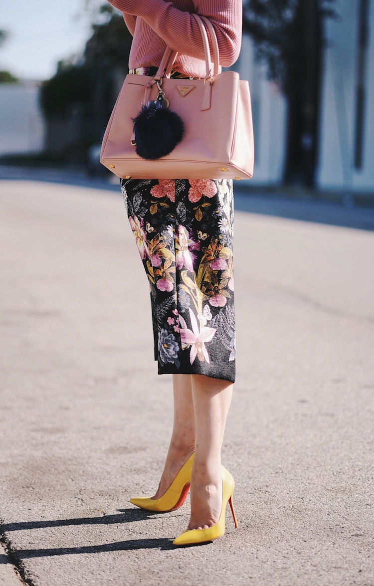 Feminine In Pink Style, Summer Knit Wear, Floral Midi Skirt, Prada Bag, Pom Pom Key Chain, Christian Louboutin So Kate, via: HallieDaily