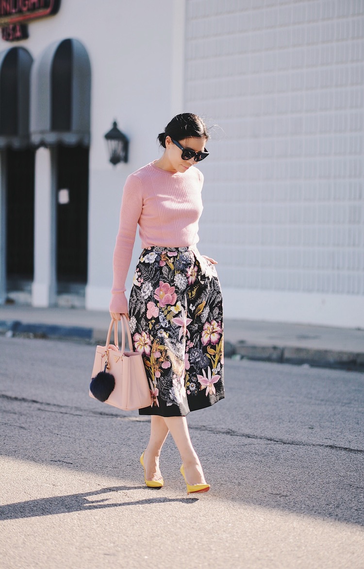 Feminine In Pink Style, Summer Knit Wear, Floral Midi Skirt, Prada Bag, Pom Pom Key Chain, Christian Louboutin So Kate, via: HallieDaily