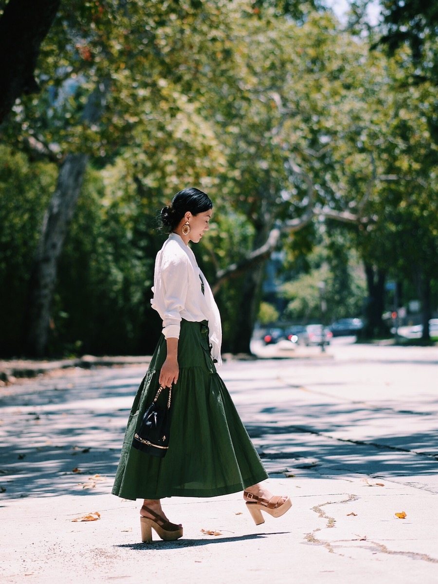 Easy Breathe: Silk Bow Tie Blouse, Marissa Webb Llsa Skirt, Platform Clogs, Mini Bucket Bag, via: HallieDaily