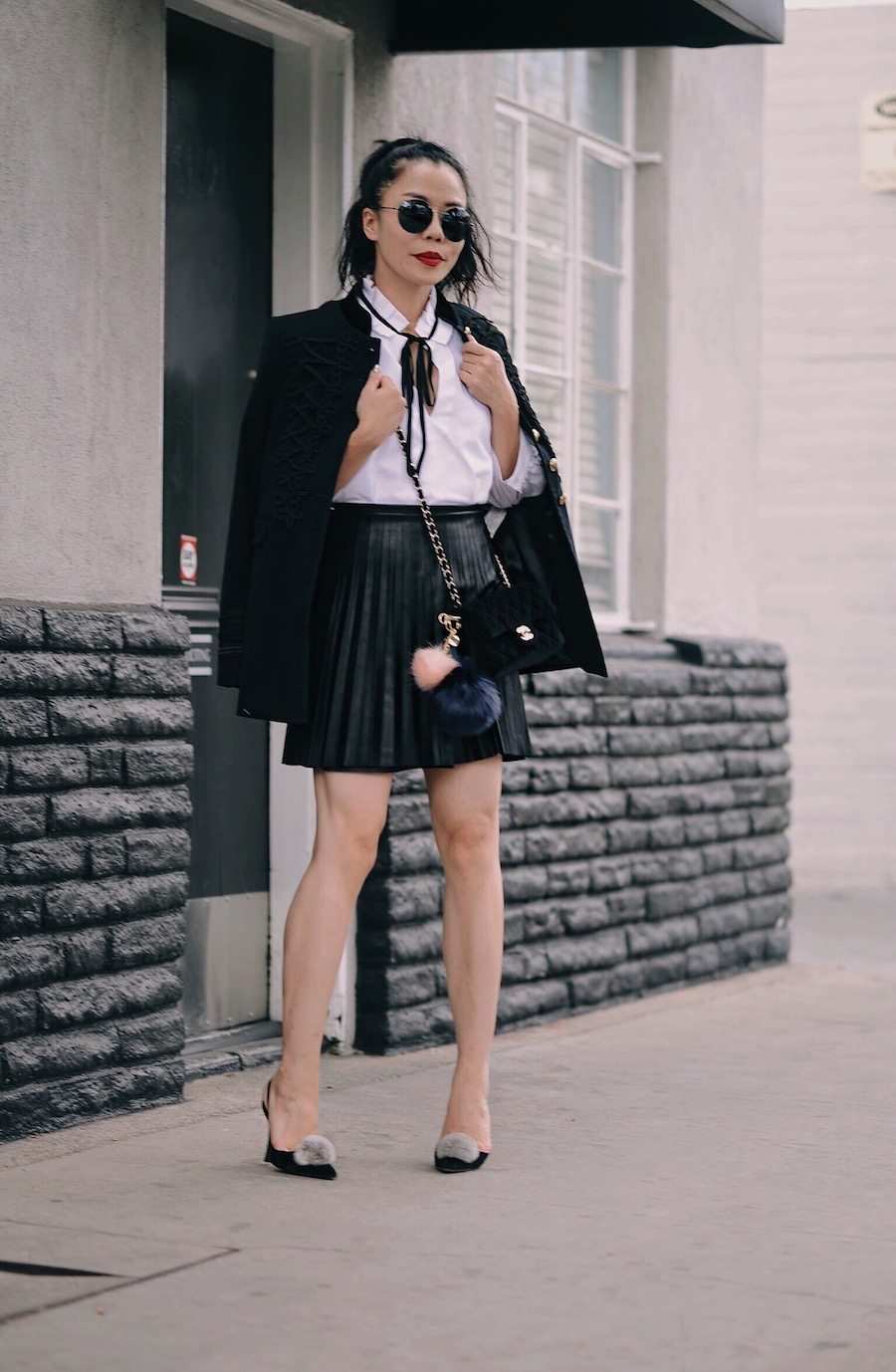 Military Jacket, Pleated Skirt, Bow Blouse, Pom Pom Shoes, Chanel Velvet Bag, via: HallieDaily